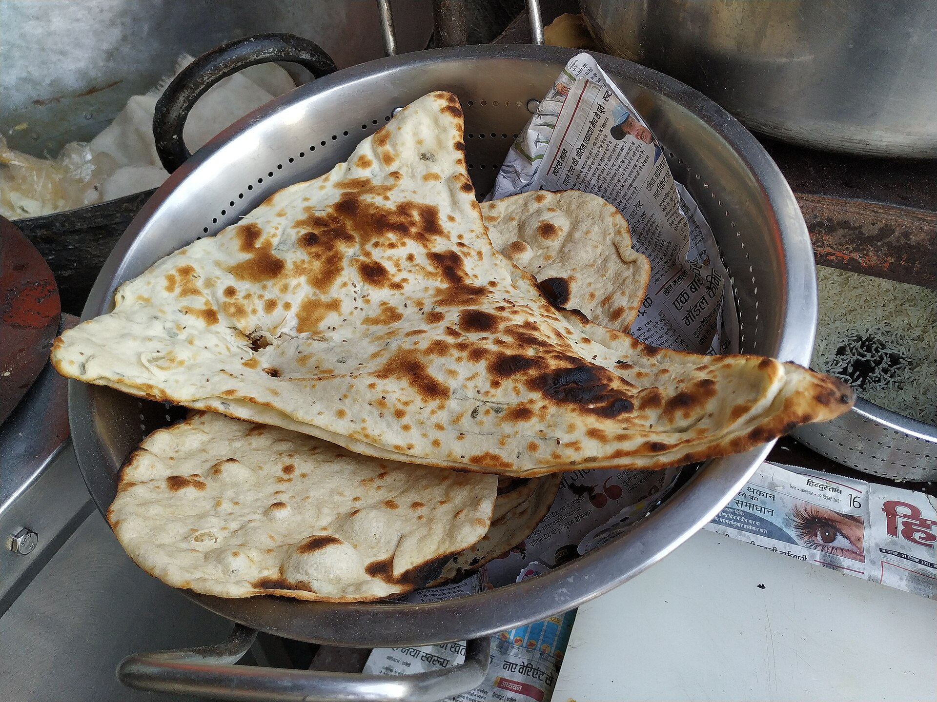 Fresh tandoori naan straight from the live tandoor